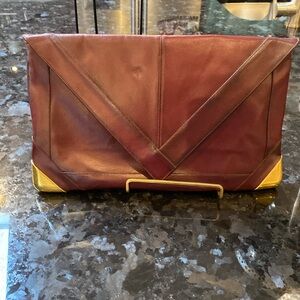 Large burgundy leather envelope clutch